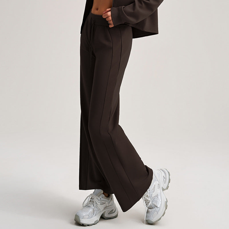 Dark brown wide-leg sweatpants with drawstring and elastic waistband, side profile