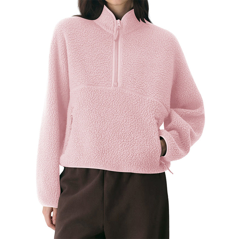 Women’s pink fleece quarter-zip pullover with front pocket and long sleeves