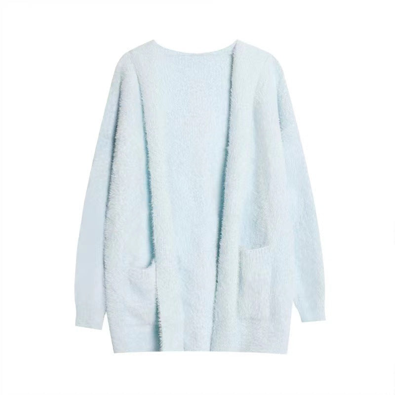 Oversized light blue wool cardigan with shawl collar, open front, side pockets, chunky knit