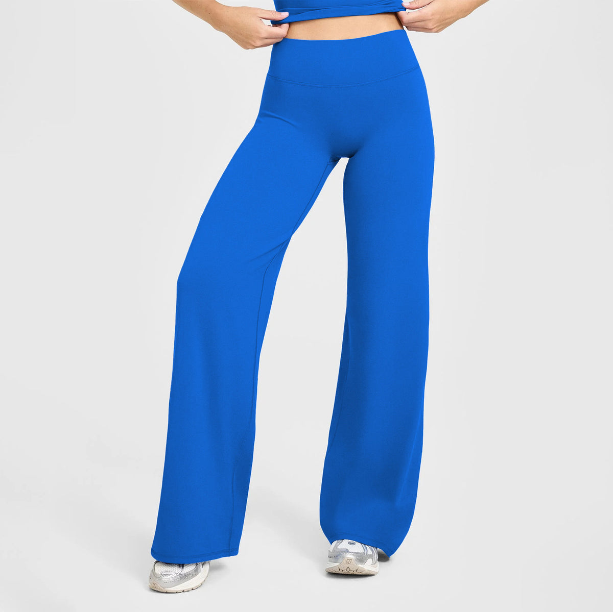 High-waisted straight-leg yoga pants in bright electric blue, long wide-leg silhouette
