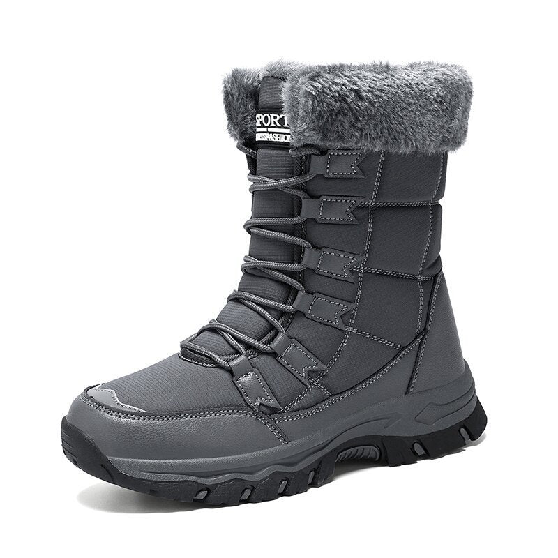 Women’s gray mid-calf snow boots with faux-fur collar and lace-up straps, chunky outsole