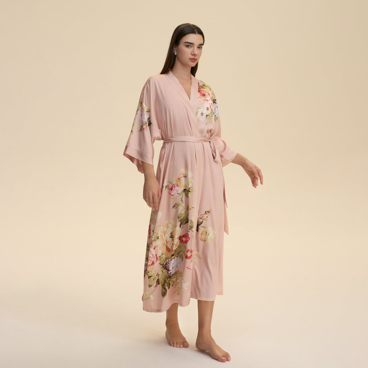 Blush pink satin robe with floral print, V-neck, waist tie belt, flowing kimono sleeves