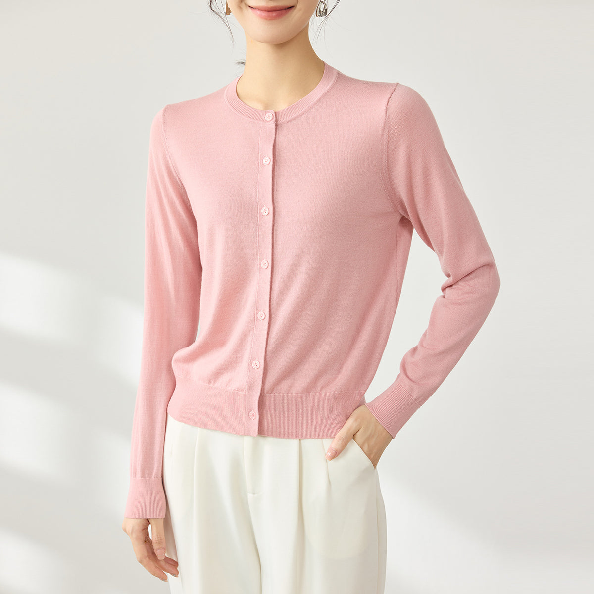 Women's pink wool cardigan, round neck button-front, long sleeves
