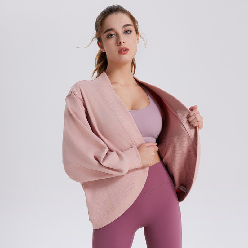 Women’s pink long-sleeve athletic cardigan top, open front, ribbed cuffs