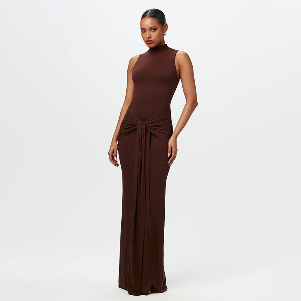 Brown sleeveless maxi dress with round neck and draped waist tie