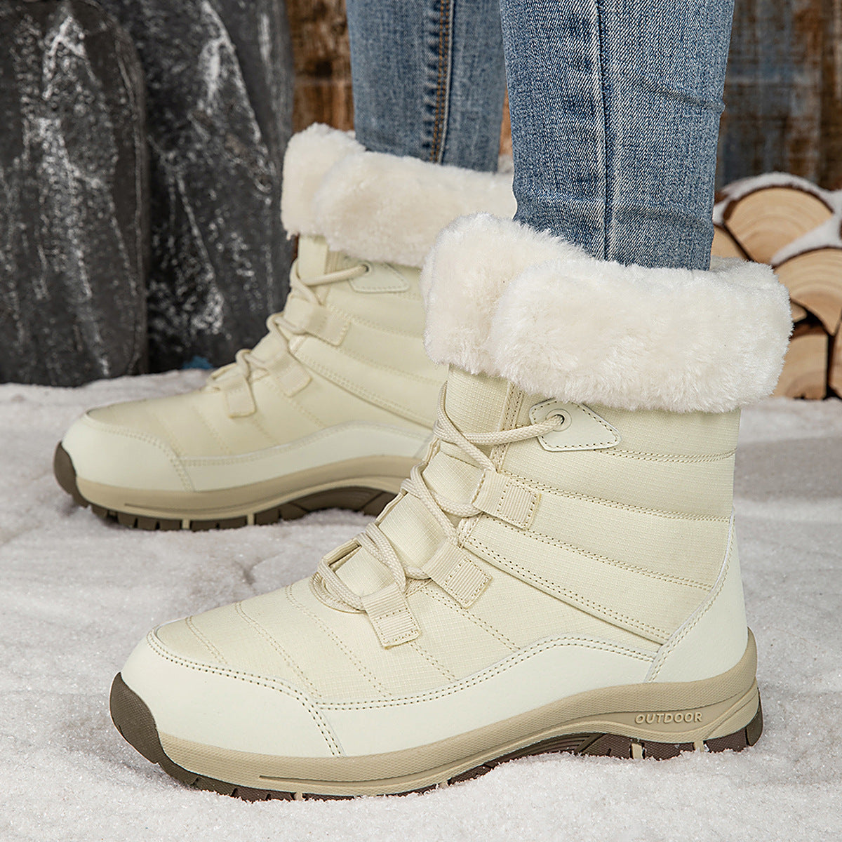 Women’s cream mid-top winter snow boots with faux fur cuffs, lace-up, grippy sole