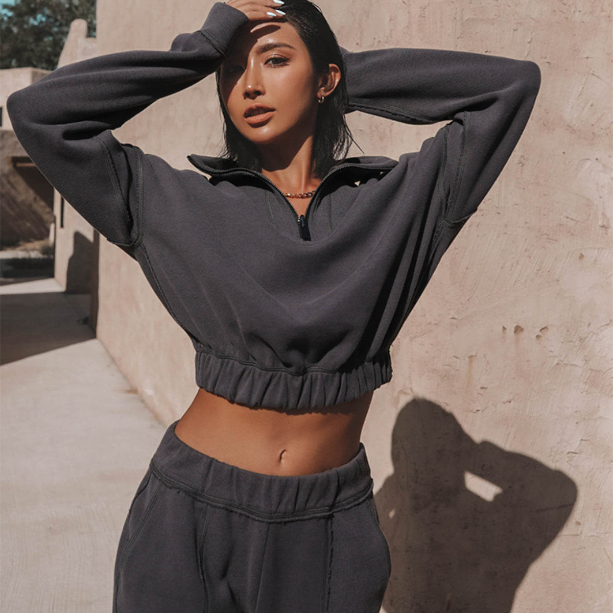 Women's charcoal cropped quarter-zip sweatshirt and jogger set with elastic waist