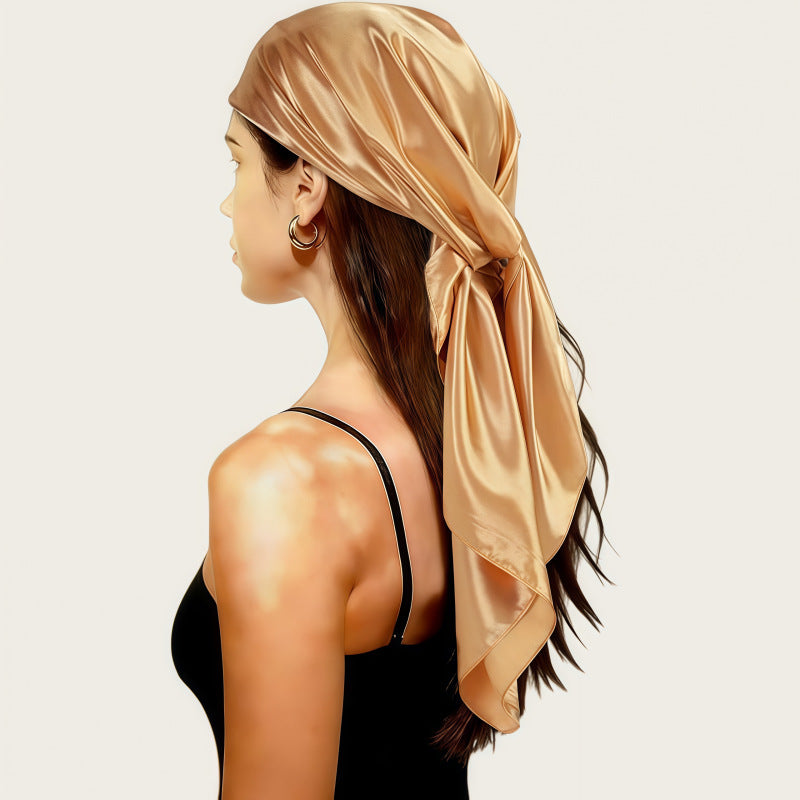 Gold satin square scarf headscarf tied with a long bow at the back