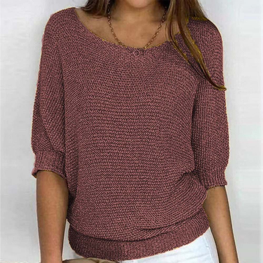 Brown textured knit top with round neckline and three-quarter sleeves