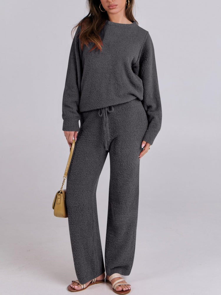 Dark gray knit lounge set with long sleeves, round neck top, and drawstring wide-leg pants