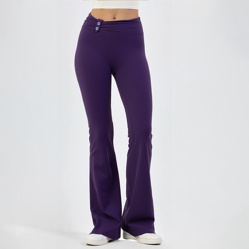 Purple high-waisted yoga flare pants with buttoned waistband, wide flared legs