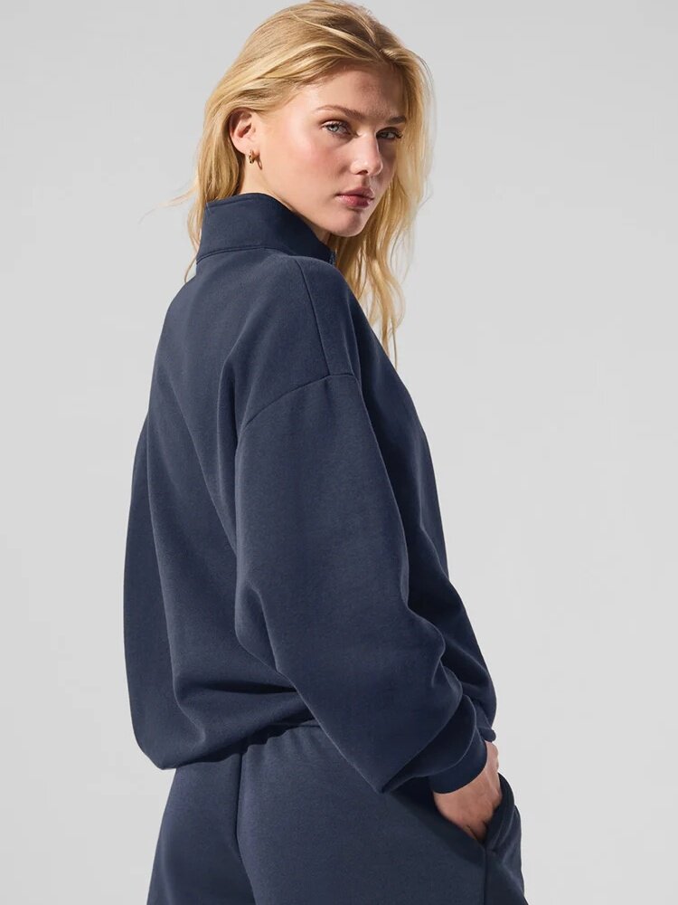 Navy half-zip pullover sweatshirt with stand collar, long sleeves, relaxed fit