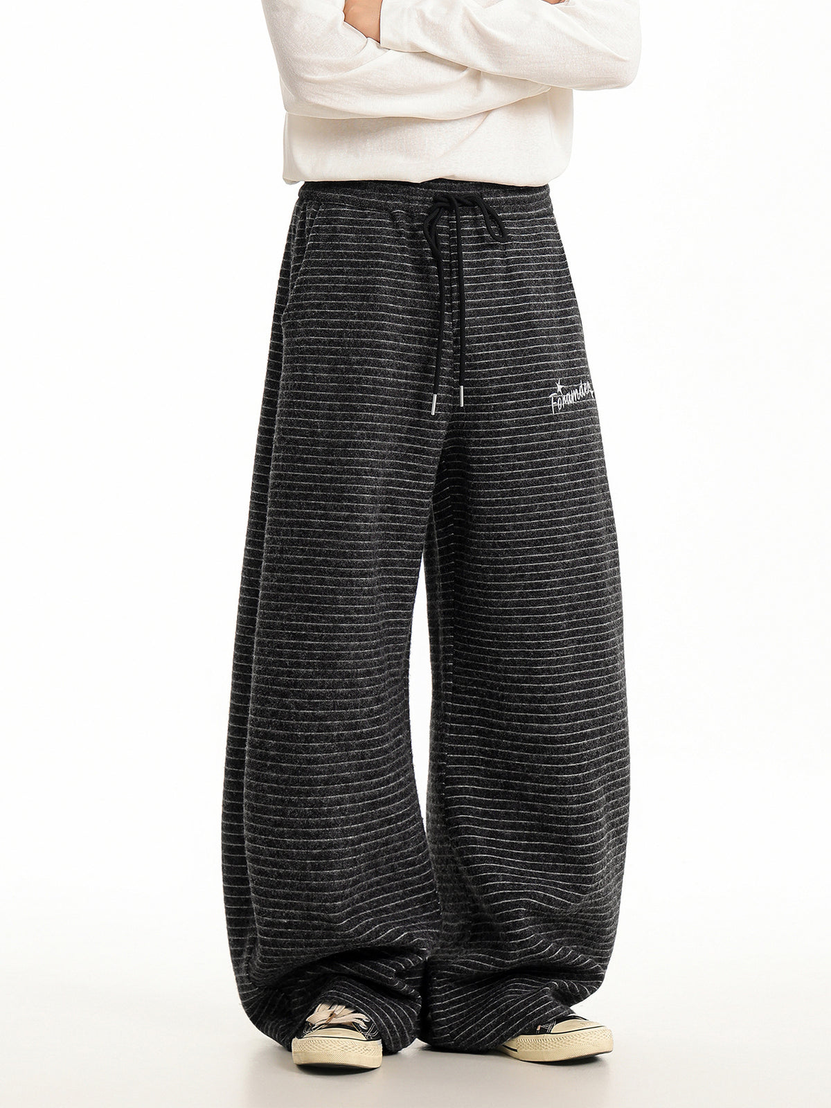 Black striped wide-leg sweatpants with drawstring and roomy straight legs