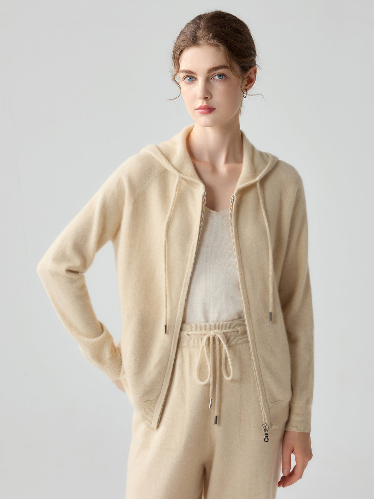 Beige hooded zip-up cashmere cardigan for women, long sleeves, drawstring hem detail