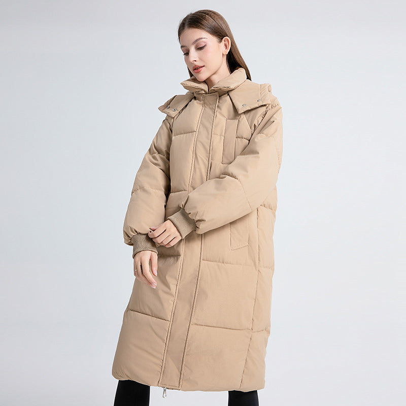 Women’s long hooded puffer cotton coat in tan, front zipper, thick padded quilting.