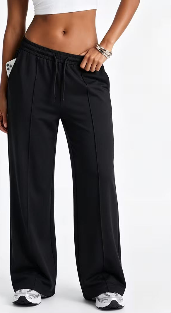 Black high-waisted elastic casual pants with relaxed wide legs, ankle length