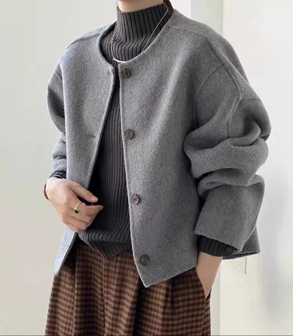 Women’s gray boiled wool jacket with button front and stand collarless neckline