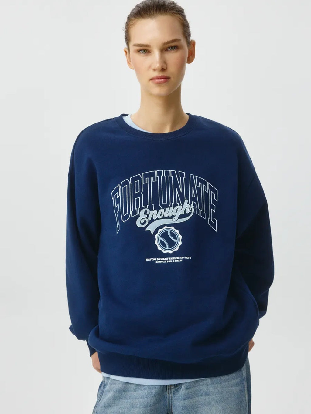 Dark blue crewneck sweatshirt with front graphic print, long sleeves