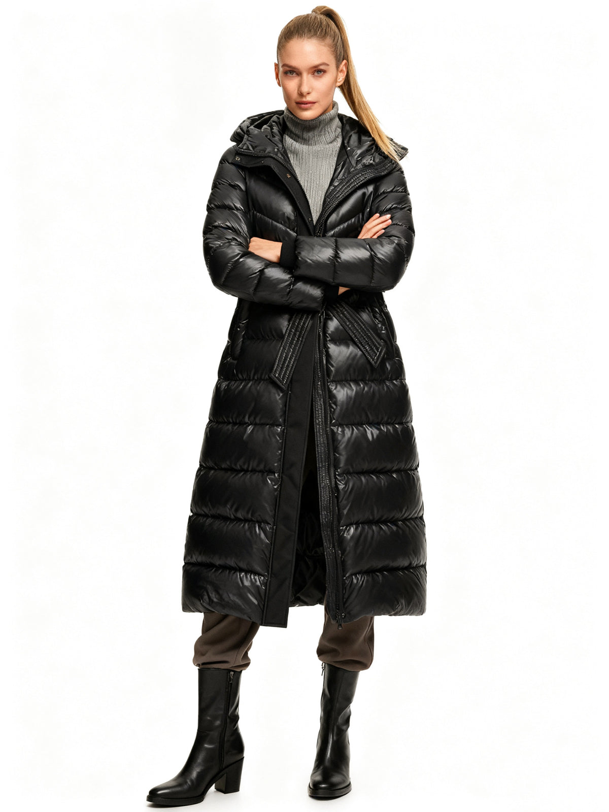 Women's black hooded long puffer coat with belt tie and front buttoned closure