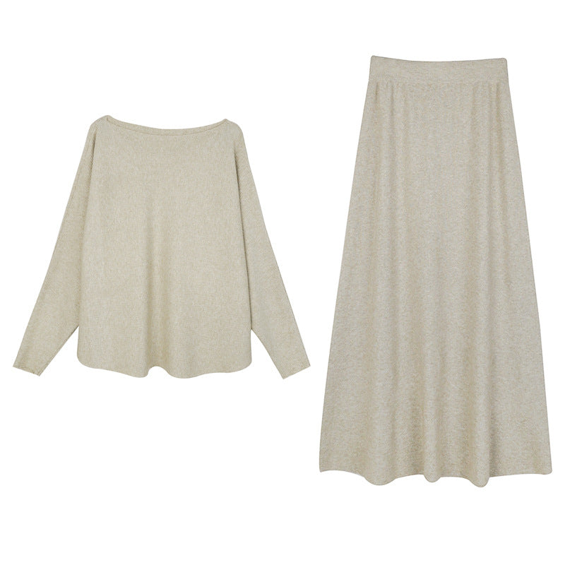 Light beige knit maxi skirt with elastic waistband and wide, flowing skirt shape