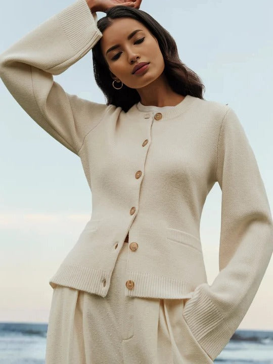 Off-white cashmere knit cardigan with button front, round neck, long sleeves