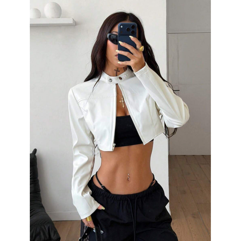 White cropped faux leather jacket with long sleeves, zip front and snap-tab collar