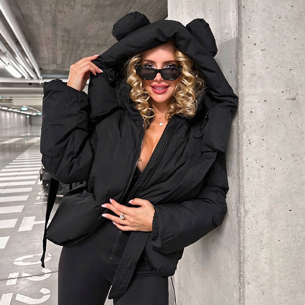 Black padded hooded jacket with rounded ear details, front zip, and long drawstrings.