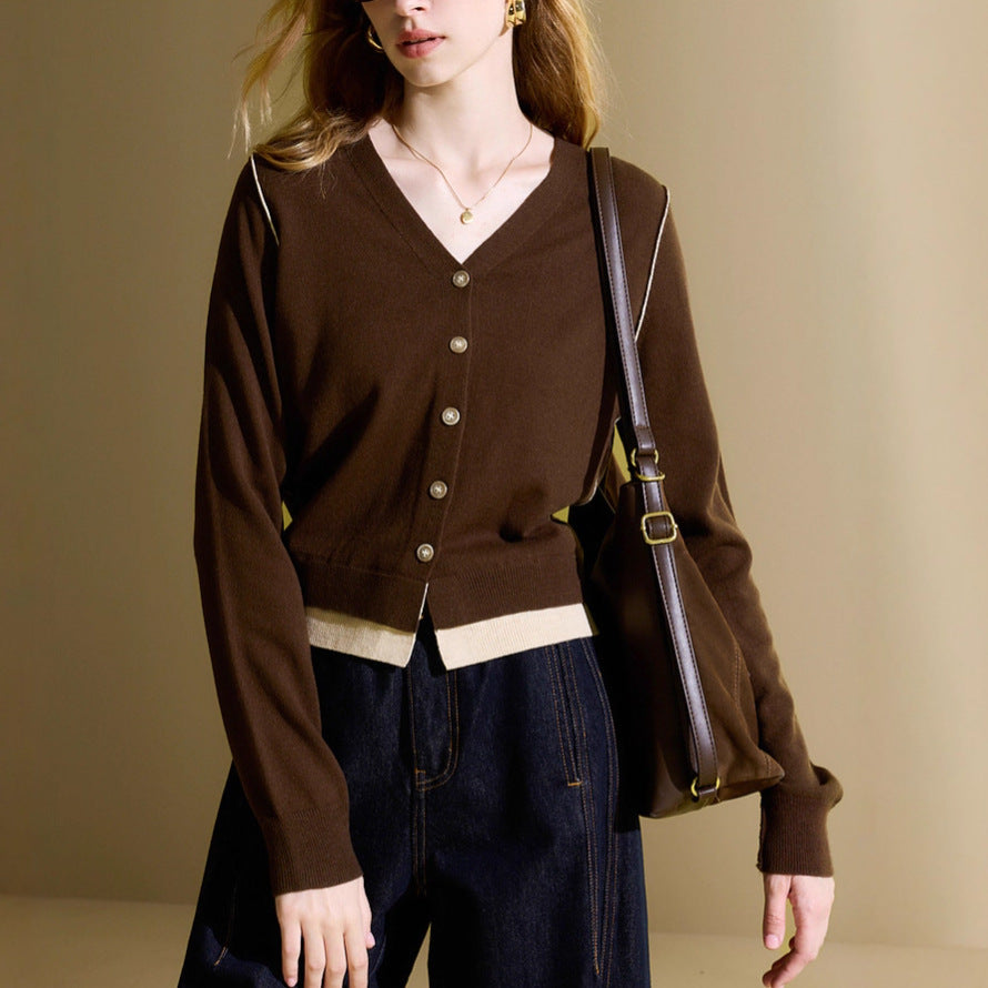Brown V-neck knit cardigan with button front and cream contrast hem band, long sleeves
