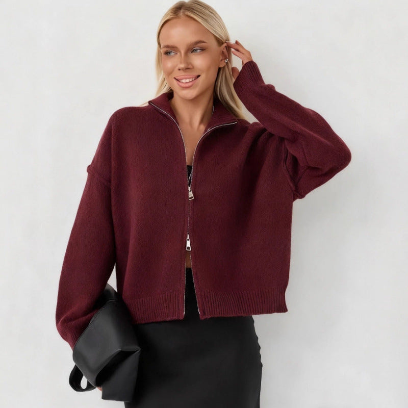 Women’s oversized zip-up cardigan sweater, burgundy funnel neck, ribbed hem and cuffs.