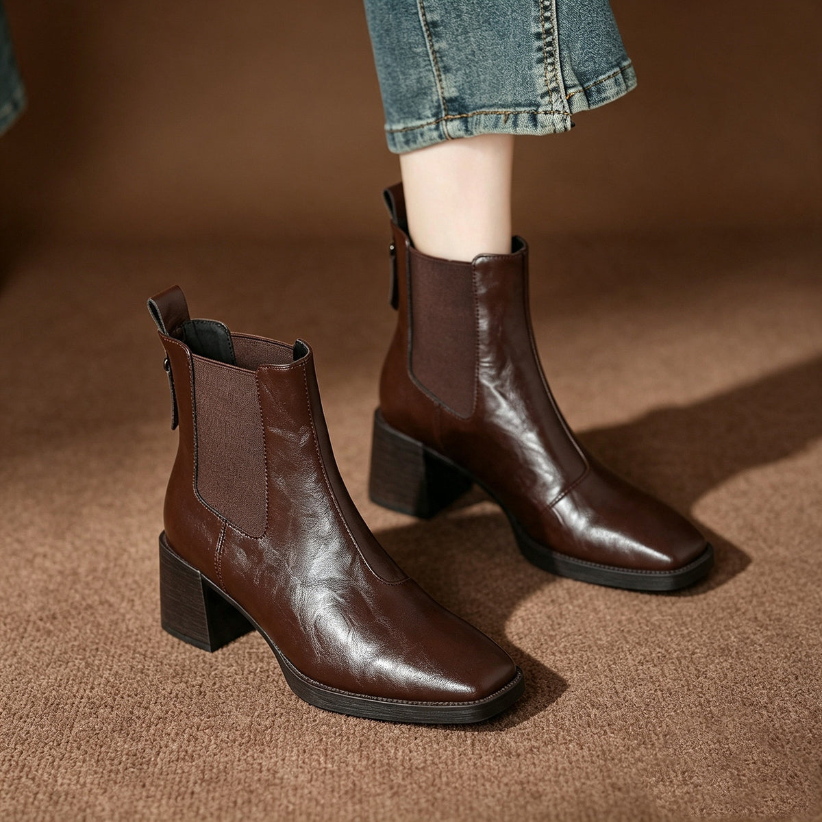 Dark brown Chelsea short boots with square toe, elastic side panels, chunky block heel.