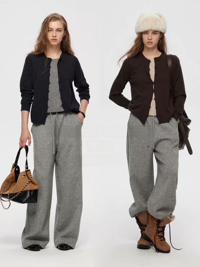 Women's black knitted cardigan and gray wide-leg pants set