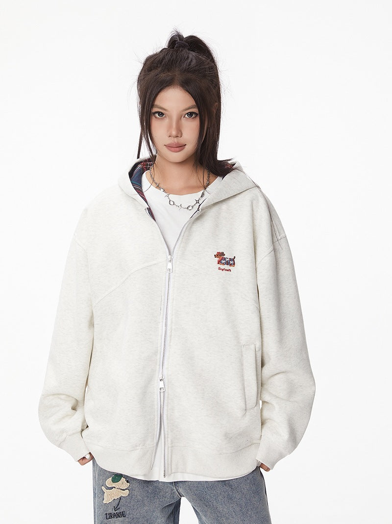 Cream zip-up hooded jacket with dachshund chest embroidery, front view