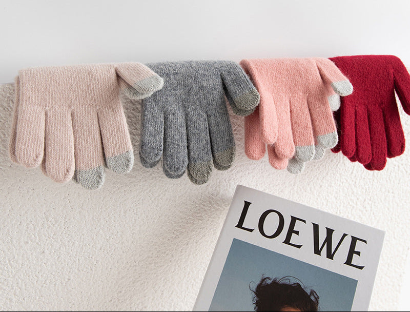 Assorted knit winter gloves in light beige, gray, blush pink, and wine red
