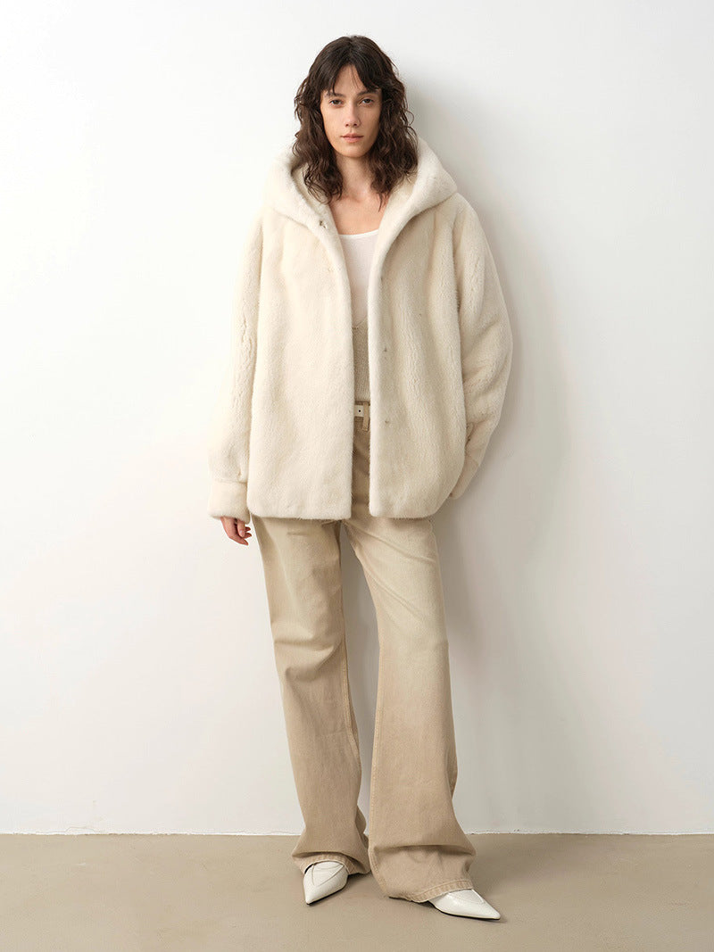 Ivory hooded faux fur coat with button front, mid-length relaxed cut