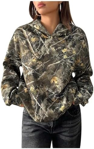 Women’s camouflage hoodie with hood and long sleeves, close-up of front print in dark tones