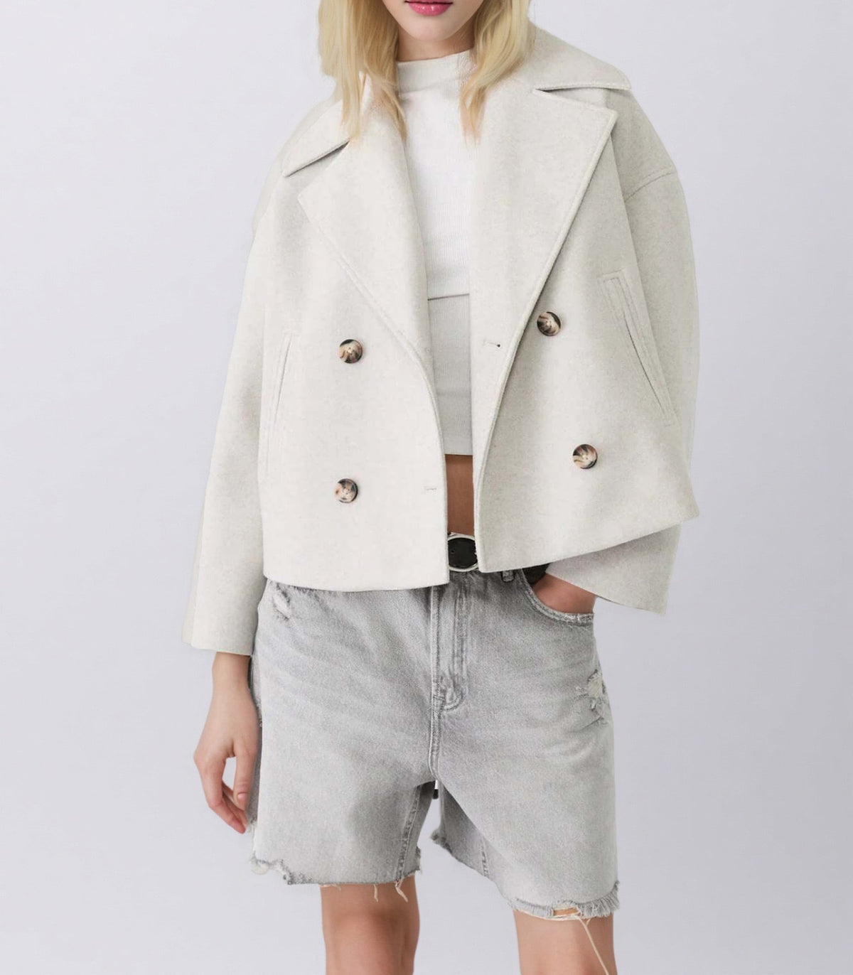 Light cream double-breasted short wool jacket with notched lapels and metallic buttons