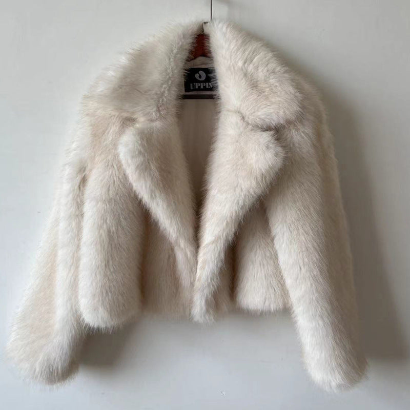 Women's light faux fur jacket with pointed lapel, open front, long sleeves.