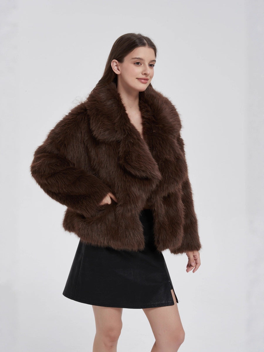 Brown faux fur short jacket with open front and fluffy oversized collar