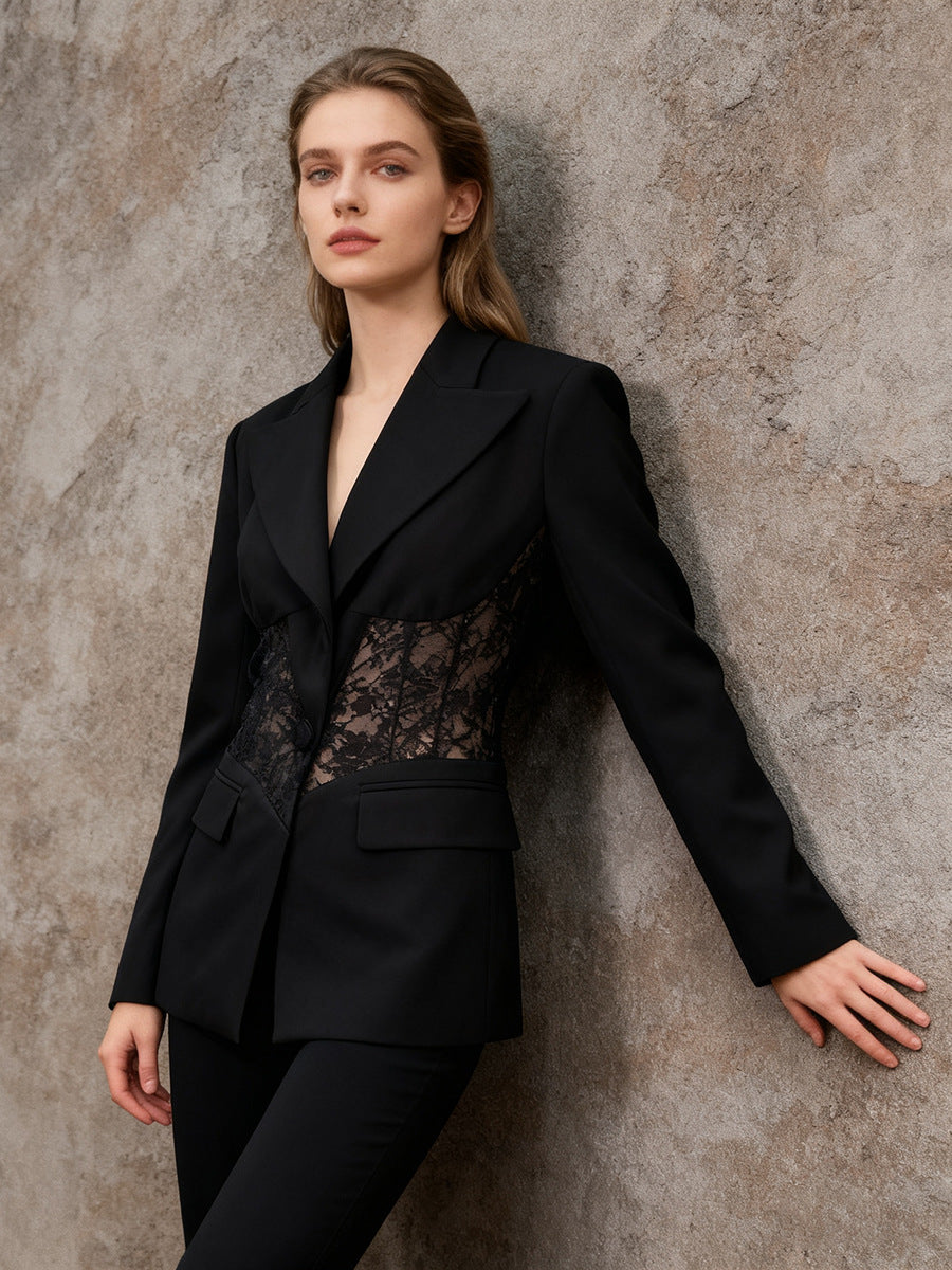 Women's black blazer with sheer lace corset-waist cutout and structured lapel