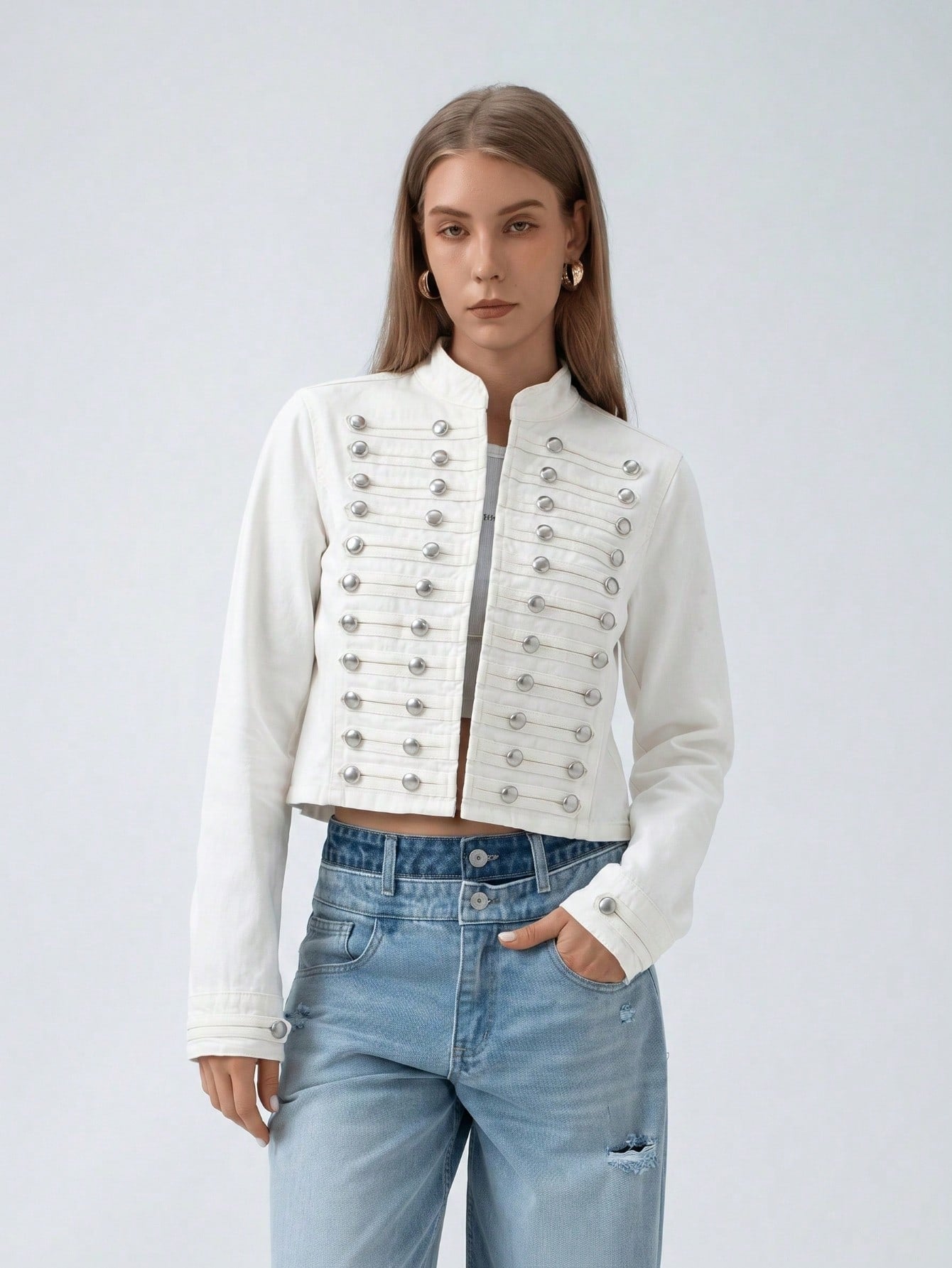 Women’s short white denim jacket with stand collar and double-breasted silver snap-stud trim