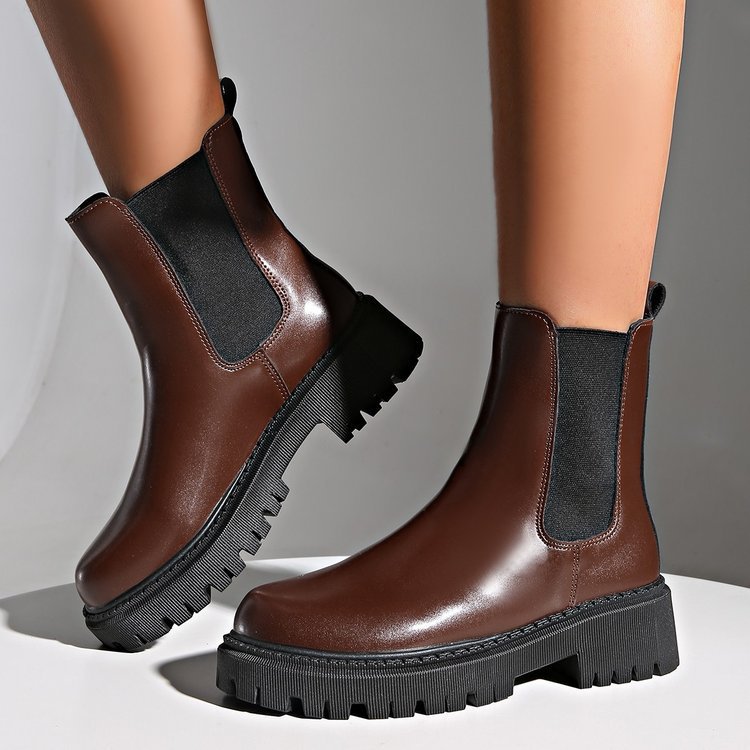 Women's brown Chelsea ankle boots with elastic gore and thick lug sole