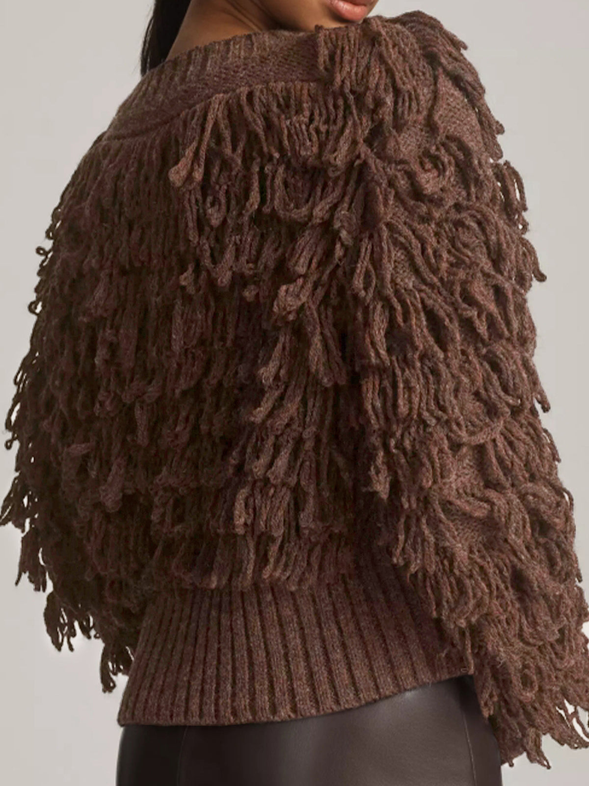 Brown fringe knit sweater jacket with button placket and ribbed hem