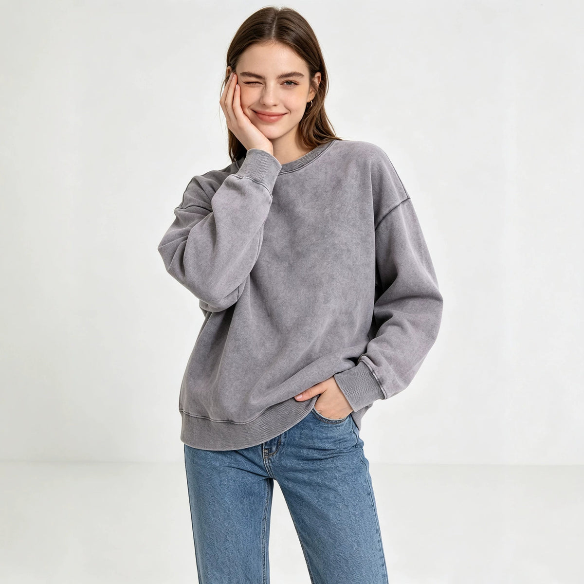Women’s crewneck sweatshirt, washed gray, long sleeves, no hood, distressed hem