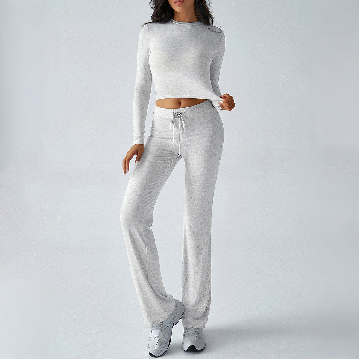 Light gray two-piece sweatsuit set: cropped long-sleeve top and wide-leg sweatpants