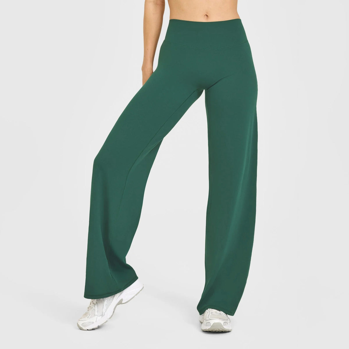 High-waisted dark green straight-leg yoga pants