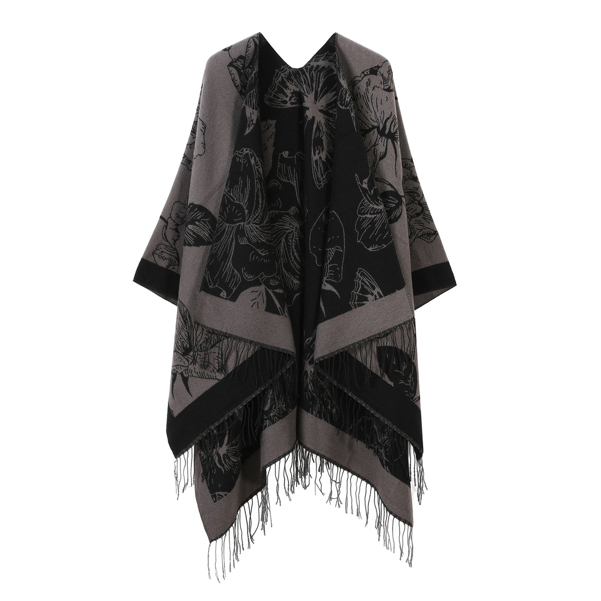 Women’s patterned shawl cape in black and gray with fringe hem and cactus print
