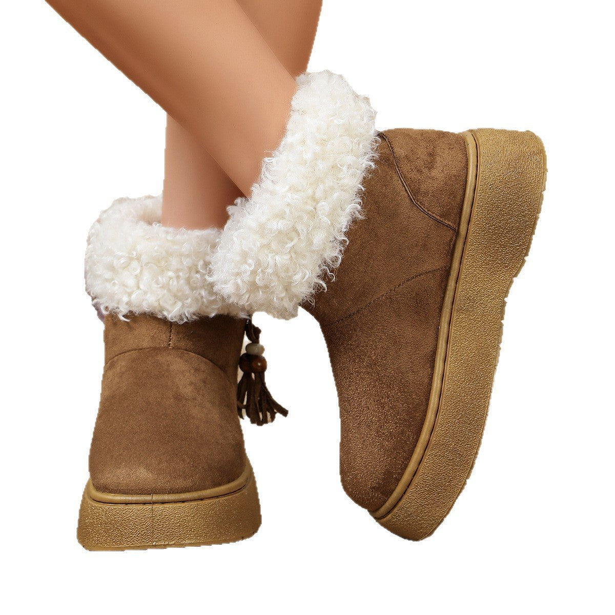 Brown suede slip-on boots with white faux-fur cuffs and tassel charm trim