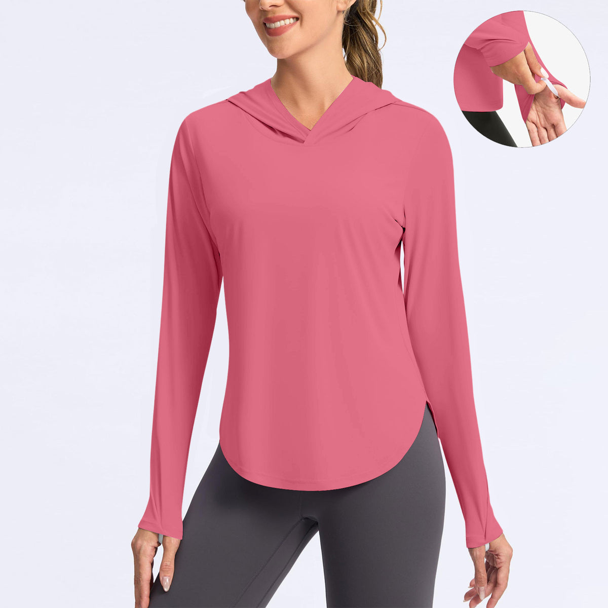 Women’s pink hooded sun protection shirt, long sleeves with thumbhole cuffs