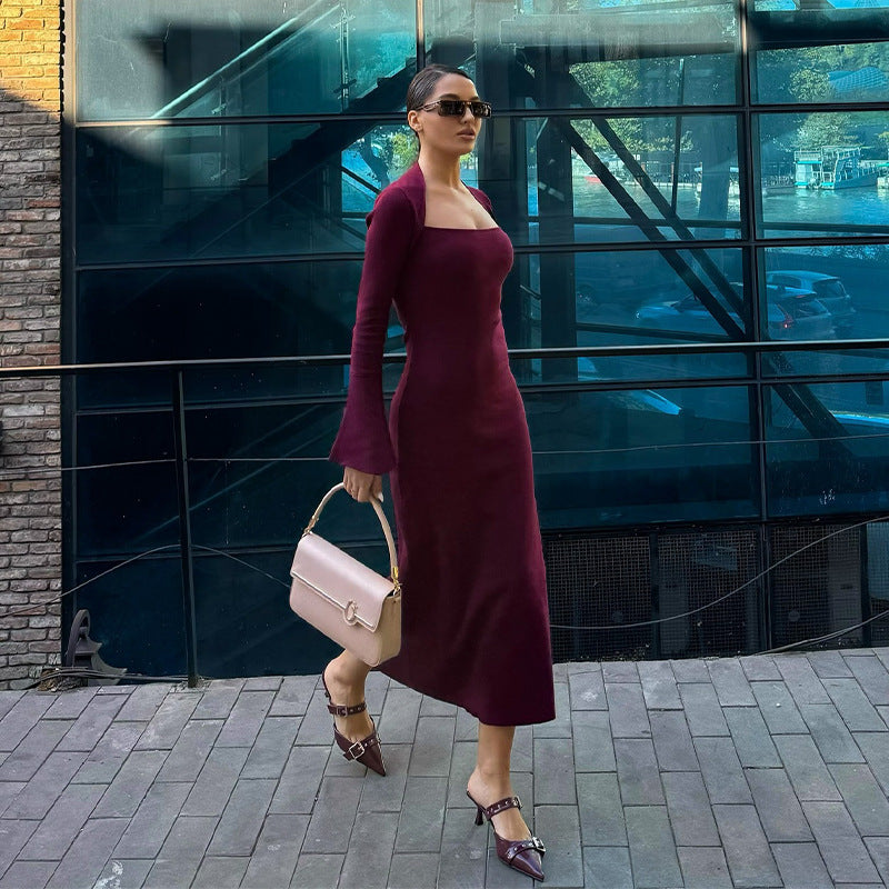 Dark purple square-neck midi knit dress with long sleeves and flared cuffs, side view
