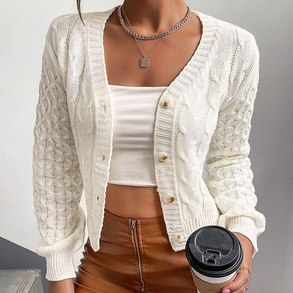 Milky white cable-knit cardigan, v-neck button front, ribbed cuffs, long sleeves
